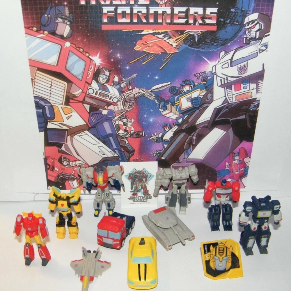 Transformers Figure Set of 12  Kit with 10 Figures and Vehicles, Tattoo and Ring